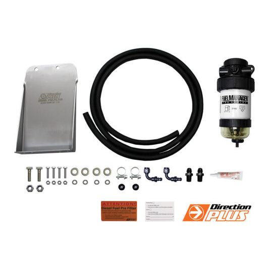 Fuel Manager pre-filter for Navara D22 installed in engine bay, showing mounting location.