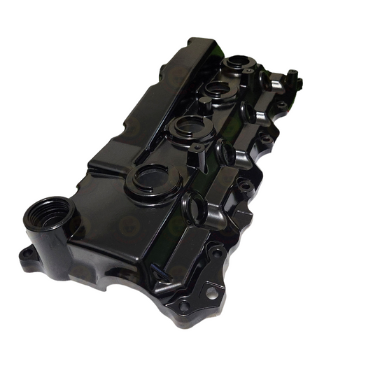 Colorful aluminium rocker cover for engine by Common Rail Cowboys, showcasing vibrant finish and detailed design.