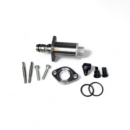 Toyota 1KD SCV suction control valve with adapter plate, showing metal valve component and mounting hardware.