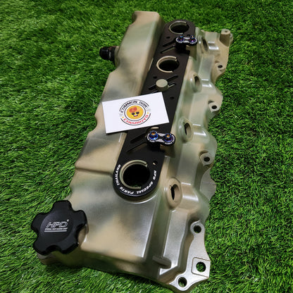 Camo alloy rocker cover for 1KD engine by Common Rail Cowboys, showcasing rugged camo design and durable metal construction.