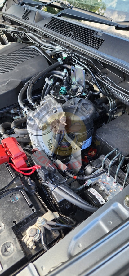 Direction Plus NP300 pre-filter and catch can kit with in-cab alarm, designed for diesel engine filtration and emissions control.