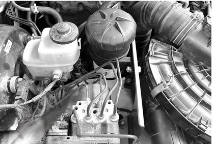 Direction Plus Hilux N70 ProVent catch can kit for 2010-2015 models, shown in image with black aluminum can and mounting hardware.