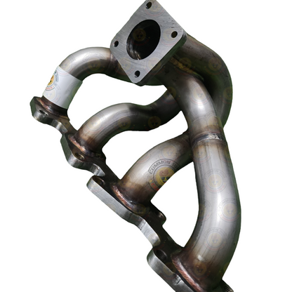 Stainless steel PPRC exhaust manifold for F44/F55 4JJ1/4JJ3 engine, showing the detailed metal construction and manifold design.