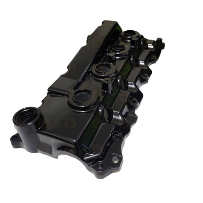 Colorful aluminium rocker cover for engine by Common Rail Cowboys, showcasing vibrant finish and detailed design.