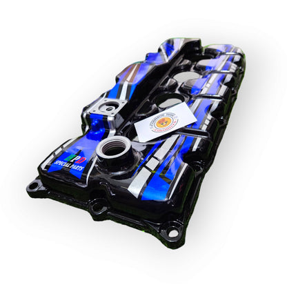 HPD Special Parts aluminium rocker cover for engine, showcasing the sleek metallic finish and detailed design.