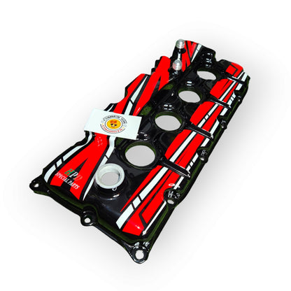 HPD Special Parts aluminium rocker cover for engine, showcasing the sleek, polished metal finish and detailed design.