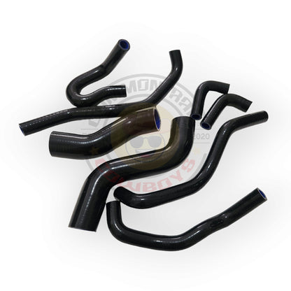 Common Rail Cowboys 1KD N70 Hilux silicone coolant hose set with multiple black hoses for engine cooling system.