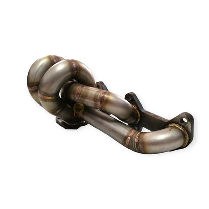 Toyota 1KD-FTV low mount exhaust manifold in stainless steel by PPRC, showing detailed metal construction.