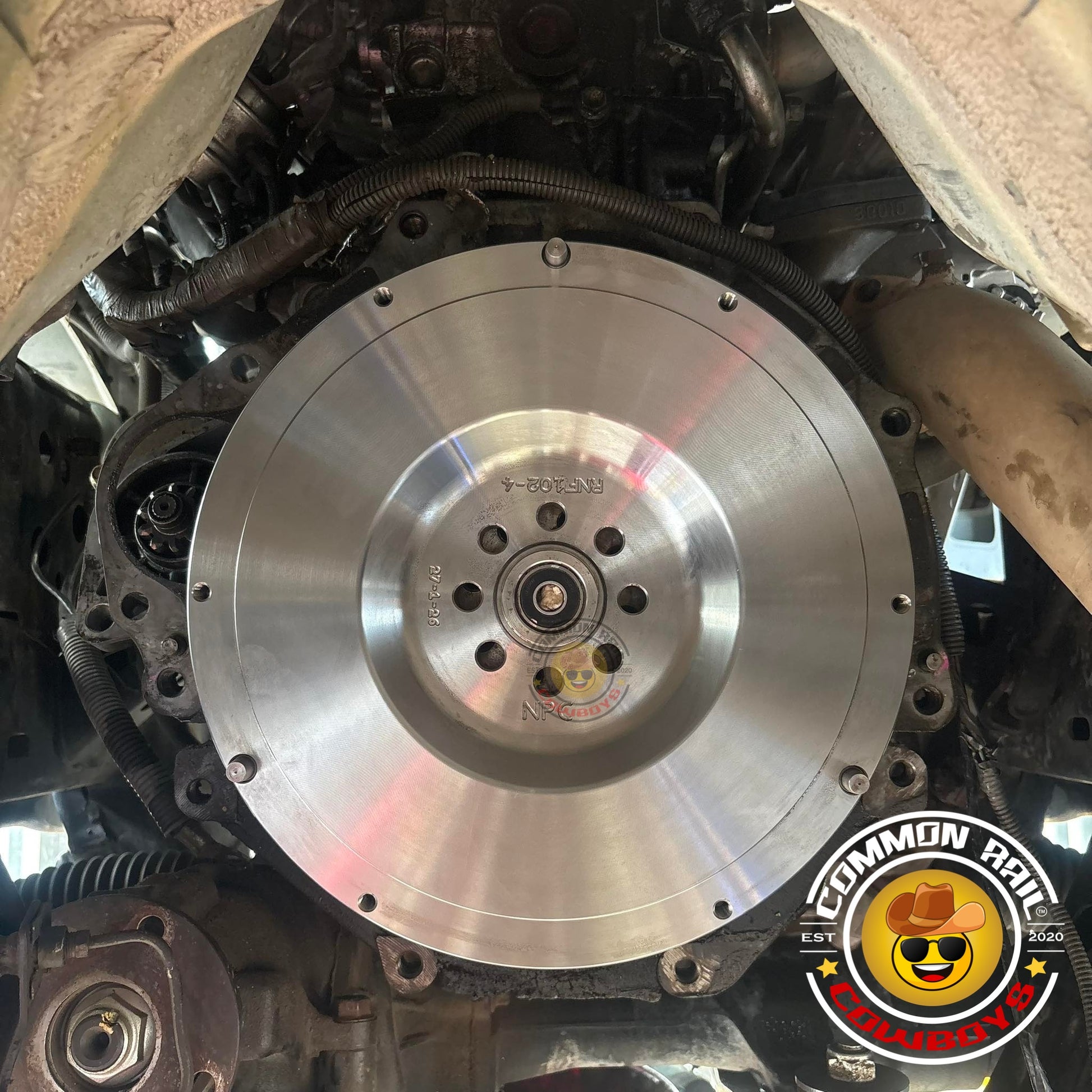 NPC Hilux N70 850NM clutch kit components, including clutch disc and pressure plate, displayed with detailed metal and rubber parts.