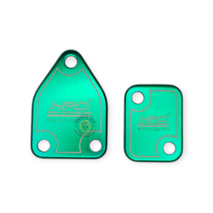 HPD Special Parts 4JJ3 EGR Delete Plates installed on engine, black metal plates for vehicle emission system removal.