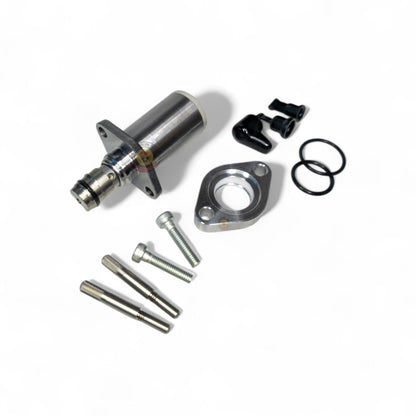 Toyota 1KD SCV suction control valve with adapter plate, showing the valve component and mounting hardware.