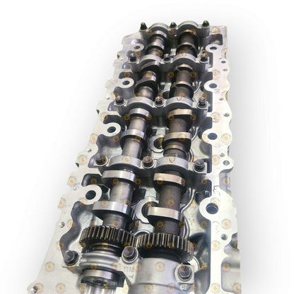 FuseTech 1KD Performance Exhaust Camshaft showing detailed metal construction and gear teeth for automotive engine upgrade.