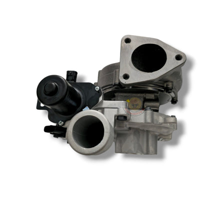 Garrett 1KD turbocharger drop-in replacement for Hilux and Prado 120, featuring a compact turbo with compressor and turbine wheels.