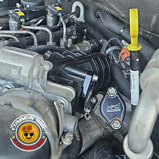 HPD Special Parts DURAMAX 2.8L EGR delete plates installed on RG Colorado engine for improved performance and emissions.