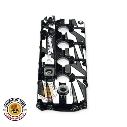 HPD Special Parts Euro 4 4JJ1 aluminium rocker cover for engine, showing the metallic finish and bolt holes.