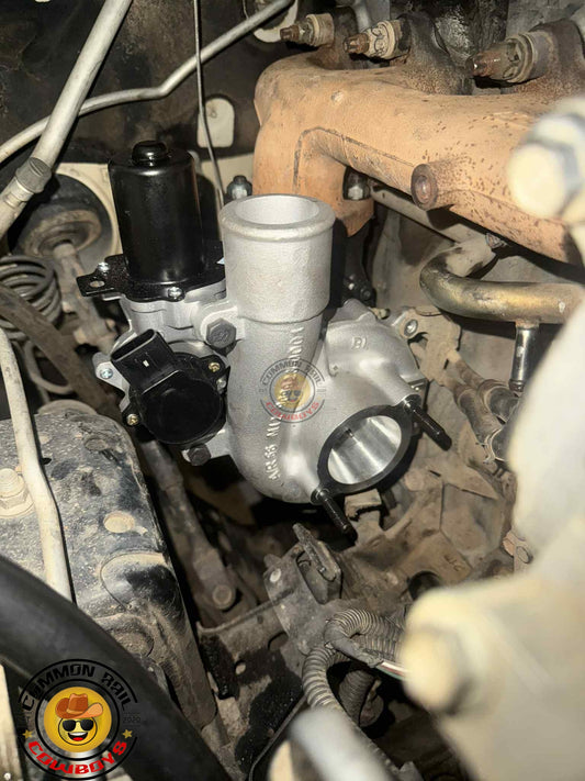 Garrett 1KD turbocharger drop-in replacement for Hilux and Prado 120, showing the turbo unit with inlet and outlet ports.