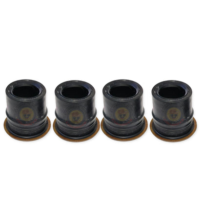Common Rail Cowboys injector pipe seals for 1KD aluminium rocker covers, close-up of black rubber seals on metal surfaces.