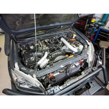 High Performance Diesel D-Max & MUX front mount intercooler for 3.0L 4JJ1-TCX engine, shown in a detailed view.