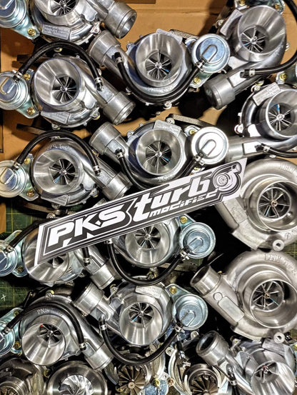 PKS 44mm Turbo for 1KD and 4JJ1 engines, showcasing the compact turbocharger with metal housing and inlet/outlet ports.